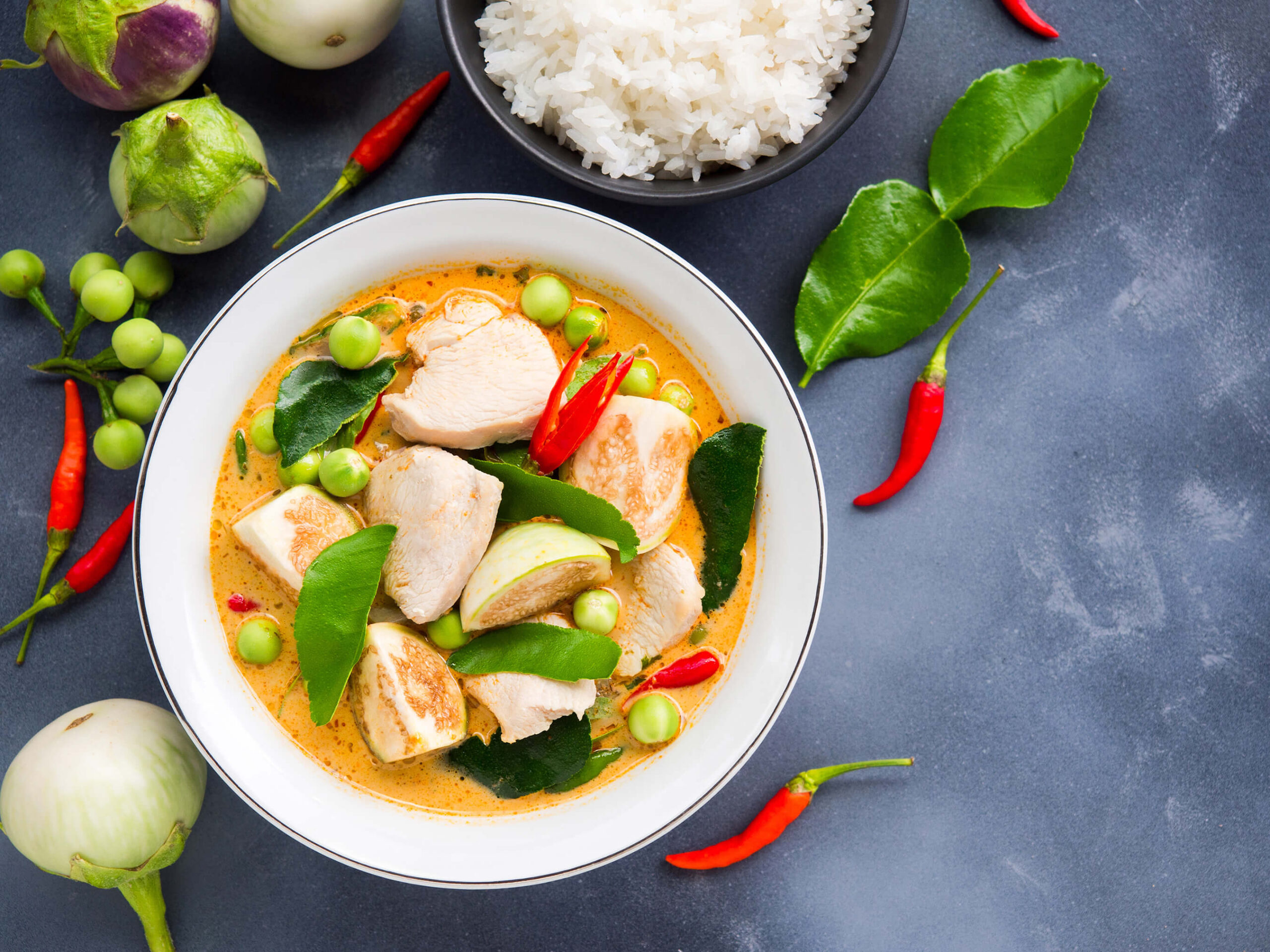 Famous traditional Thai food: Chicken red curry with eggplant and hot chili