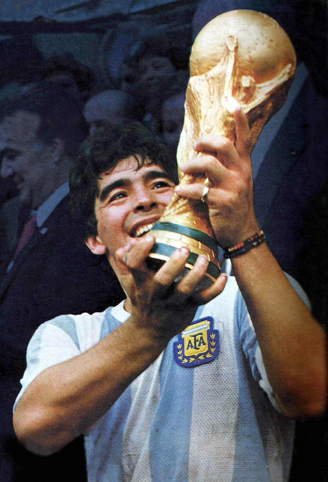 Diego Maradona holding the FIFA World Cup trophy after winning the final to West Germany